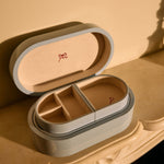 Cosmetic case with a small mirror on a decorative surface