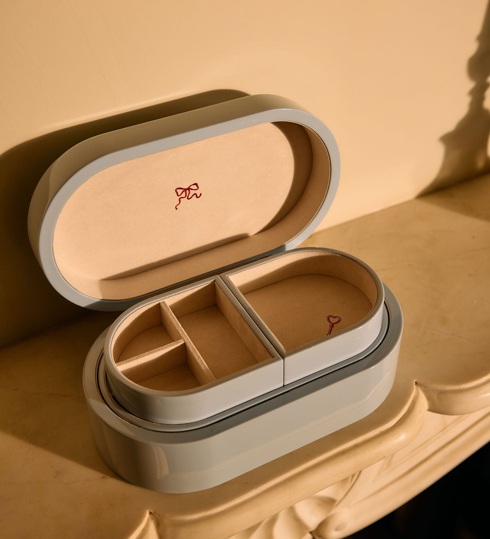 Cosmetic case with a small mirror on a decorative surface